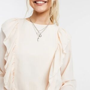 In The Style Exclusive Ruffle Detail Top in Cream